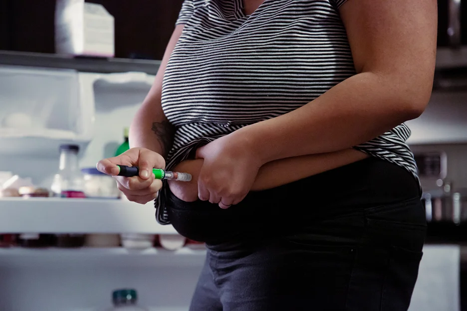 pregnant woman injecting semaglutide pen